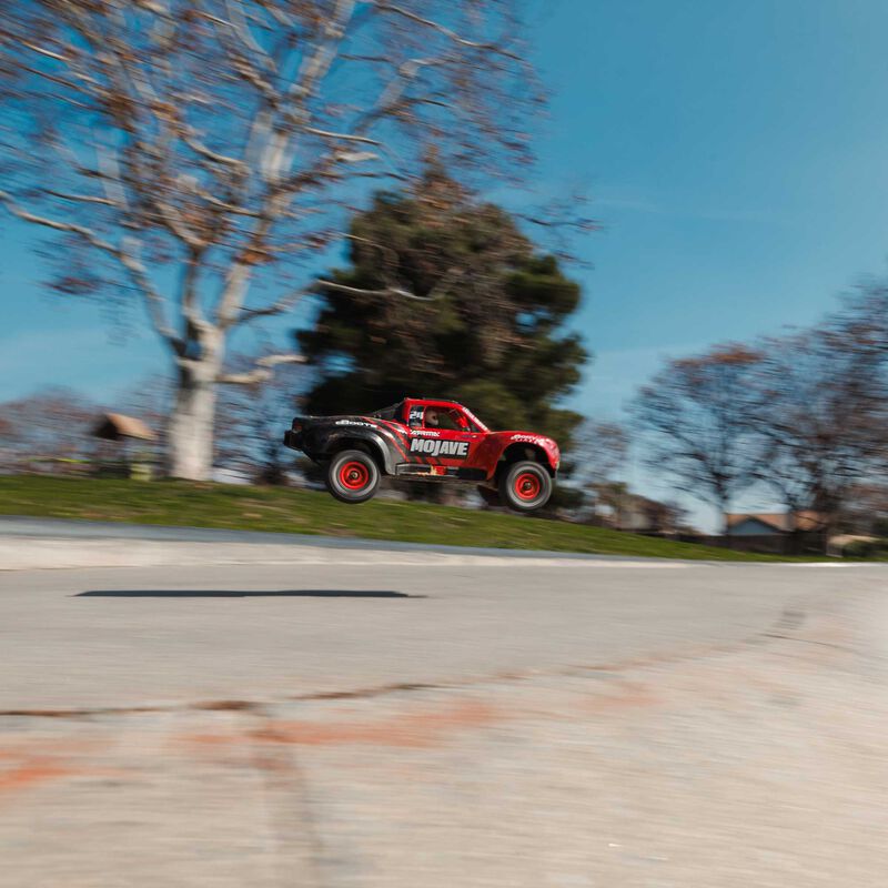 ARRMA MOJAVE GROM MEGA 380 Brushed 4X4 Small Scale Desert Truck RTR with Battery & Charger, Red/Black